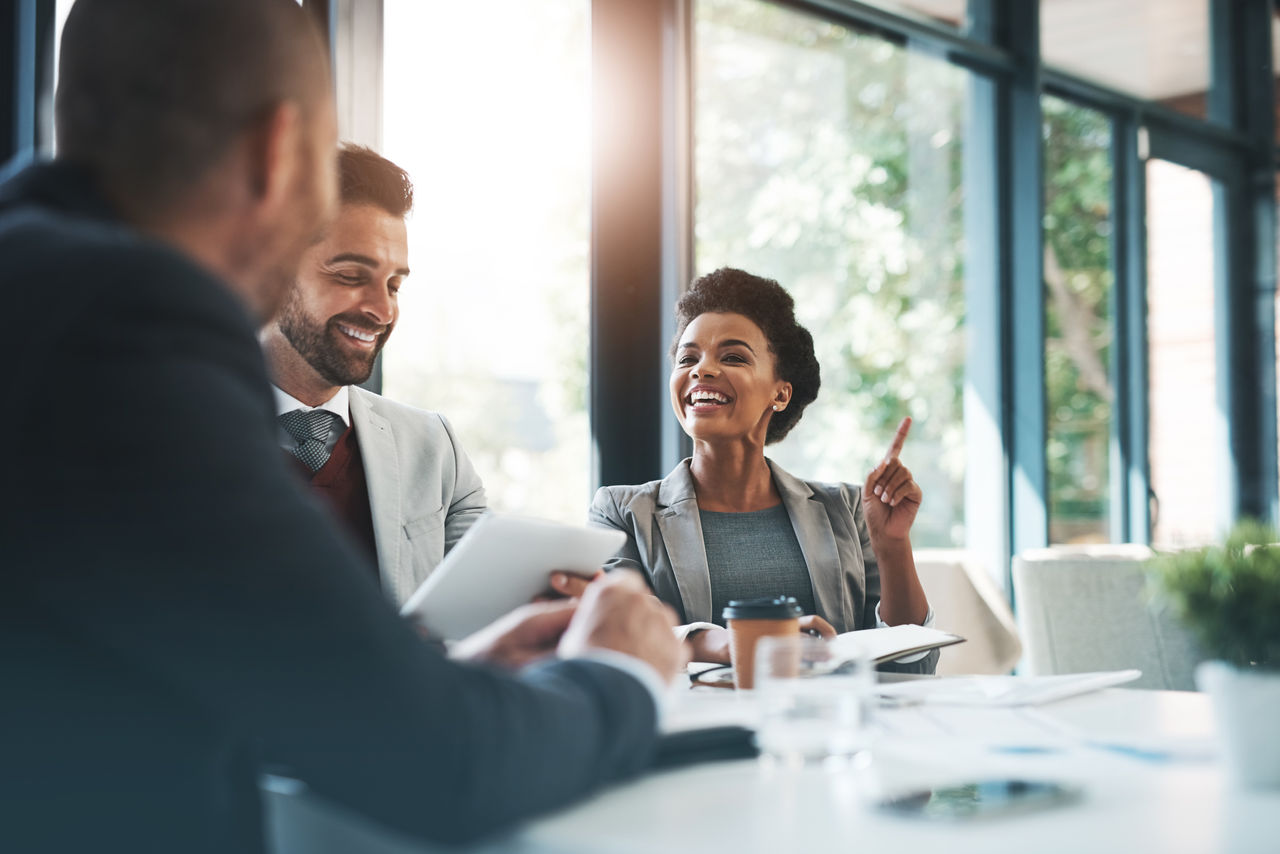 Meeting, diversity and business people in discussion in the office boardroom planning a project. Collaboration, teamwork and group of multiracial corporate employees working together in the workplace.